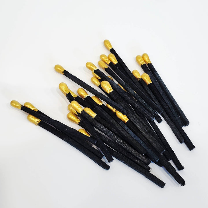 Gold Black Matches in Small Corked Vial